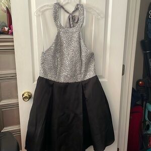 B. Darlin backless formal dress. Silver and black. Beaded top. Tie top.